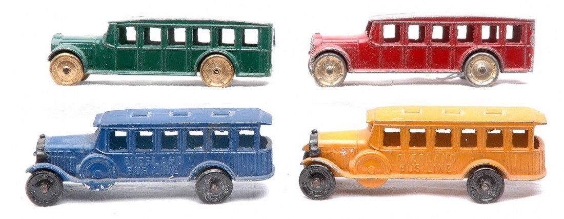 TootsieToy two 4680 Buses two 4651 Fageol Coaches: TootsieToy two 4680 cast iron Overland Bus Lines buses, one blue and one orange/yellow. The buses measure 3 1/2 inches in length. Also included are two 4651 die cast Fageol Safety coaches, one red and