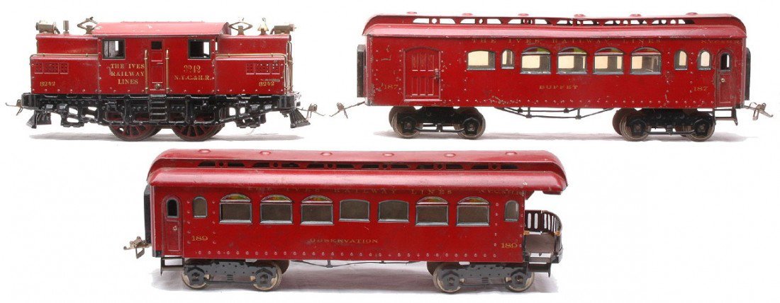 Ives Maroon Passenger Set 3242 187 189: Ives prewar wide gauge maroon passenger set including; 3242 N.Y.C. & H.R. electric 0-4-0 steam loco, 187 Buffet and a 189 observation. The roof on the loco has paint touch ups. The set is C5.