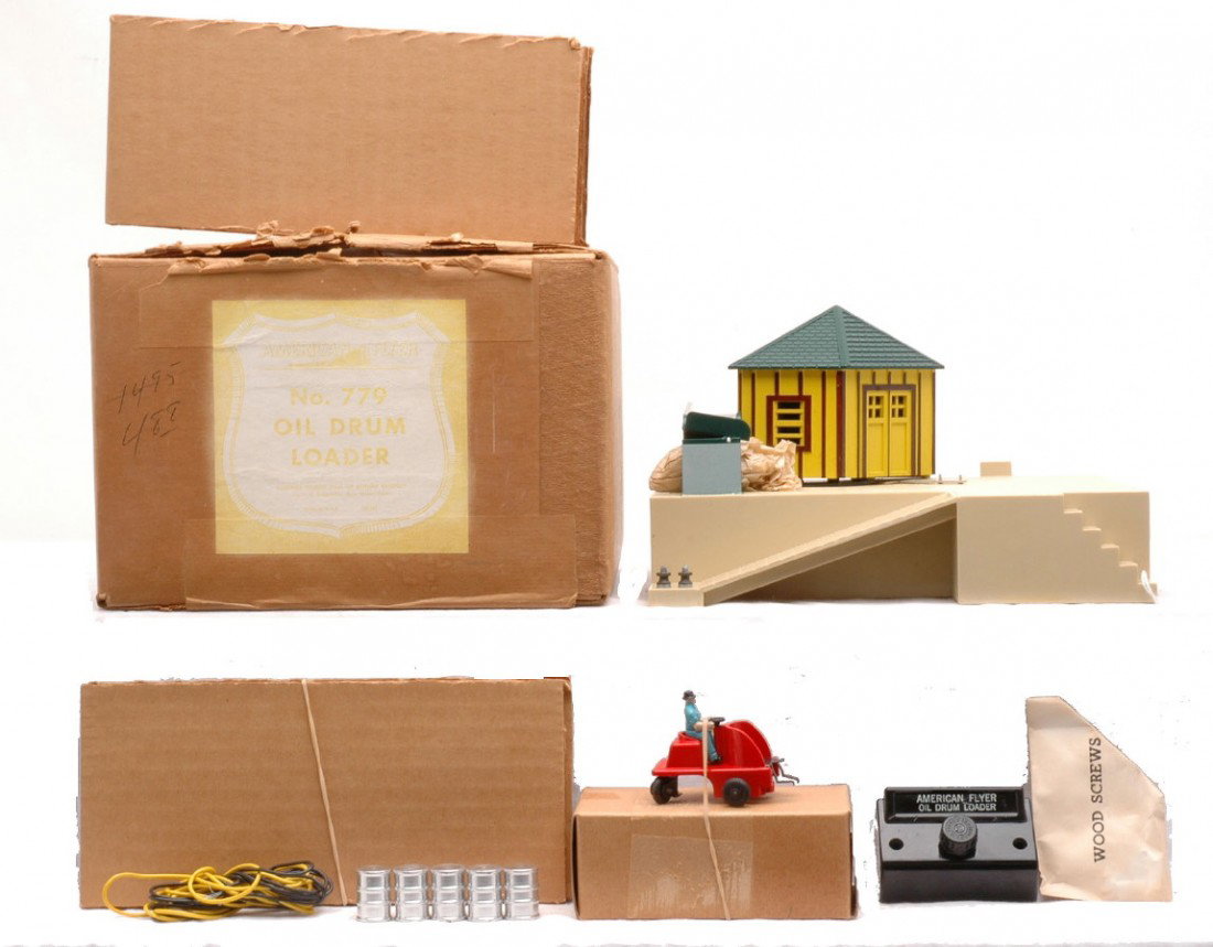 Am Flyer 779 Oil Drum Loader w/Baggage Cart MIB: American Flyer S gauge 779 oil drum loader with a baggage cart in individual OB, controller, barrels, wire and wood screws in OB that has original paper wraps and original cardboard inserts. The oil d
