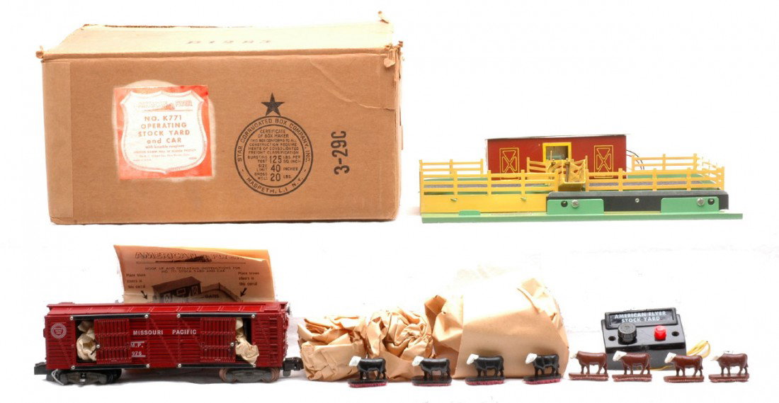 Am Flyer K771 Operating Stock Yard w/Car OB: American Flyer S gauge K771 operating stock yard with a 976 Missouri Pacific stock car, wrench, cow figures, controller and instruction sheet in OB with original paper wraps and original cardboard ins