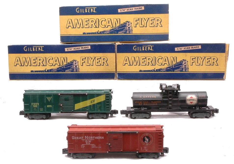 Am Flyer Freight Cars 912 913 922 Boxed: American Flyer S gauge three freight cars including; 912 Koppers Chemicals tank, 913 Great Northern boxcar and a 922 GAEX boxcar all in OBs. The cars are C7-8. The boxes have all flaps attached with s