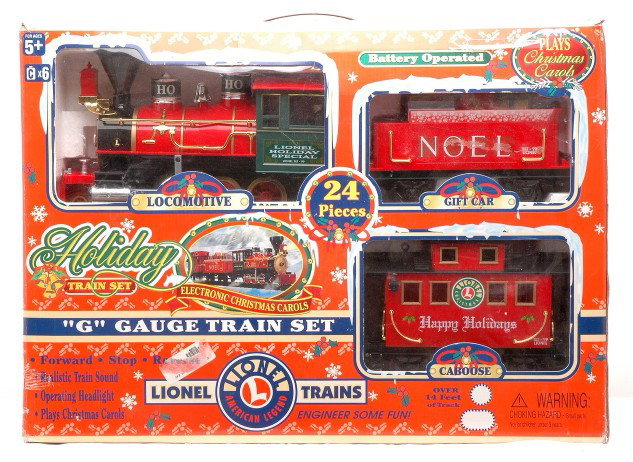 Lionel G Battery Operated Holiday Train Set MIB: Lionel G gauge battery operated 24 piece Holiday train set in OB. Set has never been run, C9.