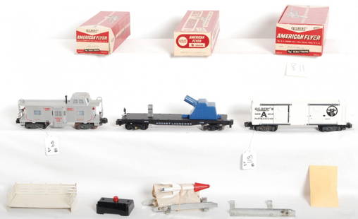 American Flyer 25019, 24633, 25059 in OB: Postwar American Flyer S gauge freight cars in original boxes, C7-8 very clean and shiny. 25019 operating milk car with platform, track blade, controller and four reproduction milk cans; 25059