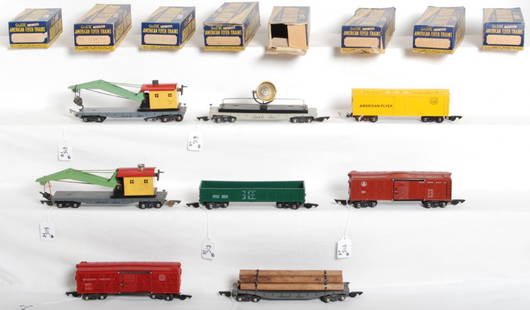 Eight American Flyer freight cars in original boxe: Postwar American Flyer S gauge freight cars in original boxes, C7-8 except for 633 which is sold as is with no returns. 628 C.&N.W.Ry. flatcar w/load, 629 Missouri Pacific cattle car, 631 T&P