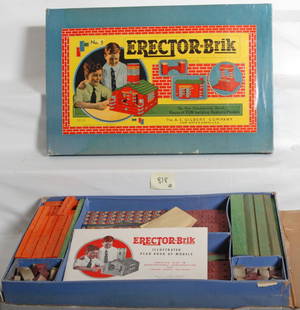 1944 No. 5 Gilbert Erector-Brik set: AC Gilbert 1944 number five Erector-Brik set. Set a very large group of ceramic bricks and they weigh much more than the cardboard set box was designed to hold. The set has been kept in a cardboard