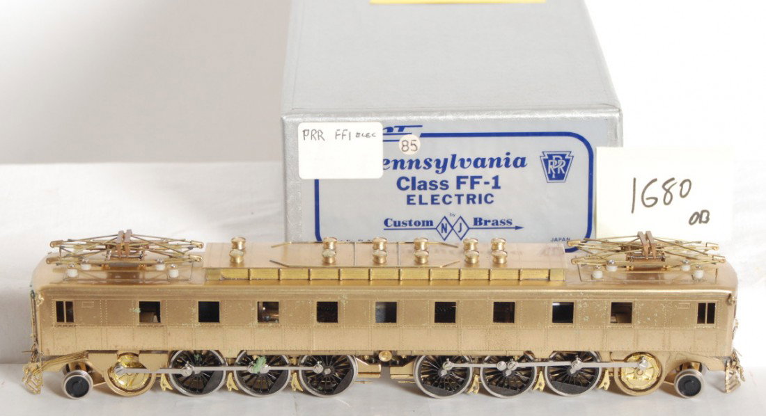 NJ Custom Pennsylvania FF-1 electric loco: NJ Custom Brass HO Pennsylvania FF-1 Electric locomotive in OB. Loco is C7-8 with some very light spotting. Catalog number is EL-328. OB has marking tags on the end.
