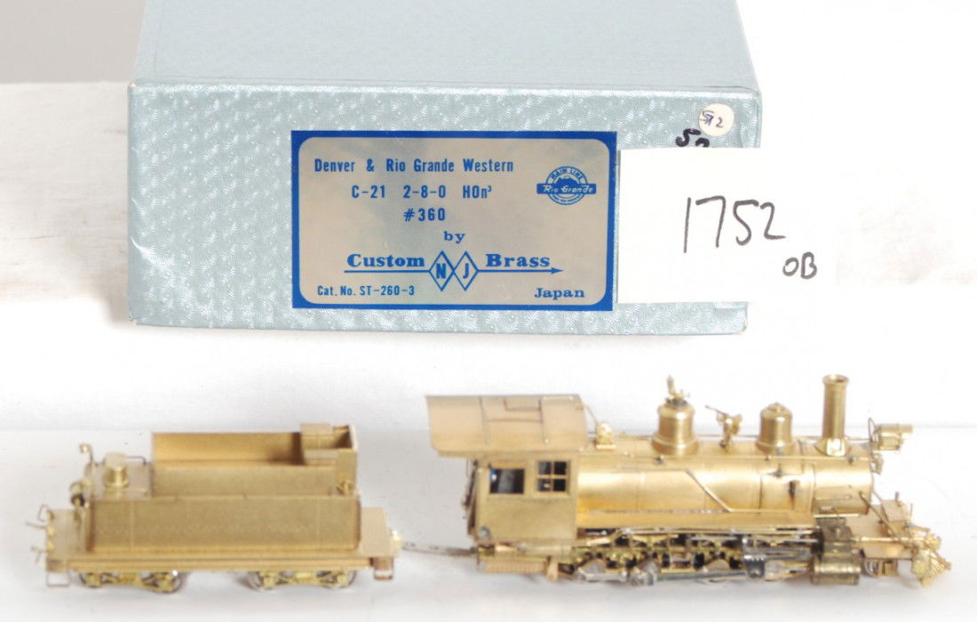 NJ Custom D&RGW C-21 2-8-0: NJ Custom brass modern HOn3 Denver Rio Grande and Western brass C-21 2-8-0 steam locomotive. Loco is C7-8 with some run time and a few small spots on the loco. OB is missing insert. and has a bit of w