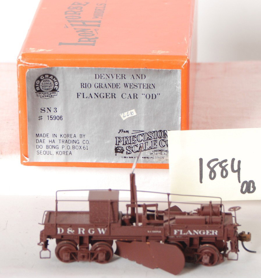 Precision Scale D&RGW brass flanger: Precision Scale Company modern Sn3 brass Denver and Rio Grande Western flanger in OB. C7 condition with plow loose and slightly bent on one wing. Also a few small paint chips.