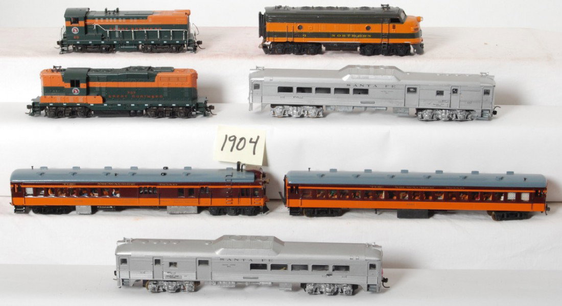 HO Budd, Interurban, and locos ATSF, Milw, GN: HO locomotives. Seven units include Santa Fe Budd car A-A set both powered, Milwaukee Road powered and dummy interurban, Great Northern SW switcher, GN F7 A unit, and GN GP series loco. Locos are gene