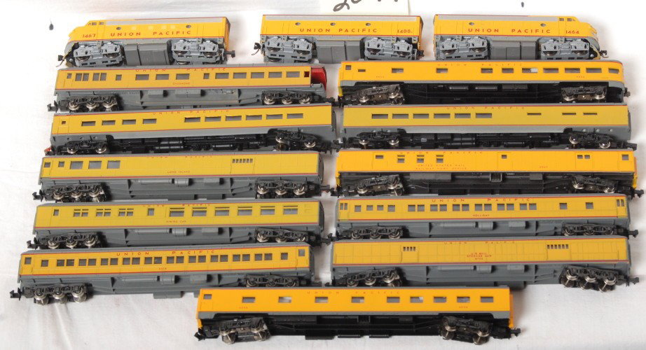 Kato Union Pacific F7 and 11 pass cars: Kato modern N scale Union Pacific F7 A-A set and eleven Atlas Riverossi passenger cars all with Kadee style couplers. Locos are both powered. C8 condition.