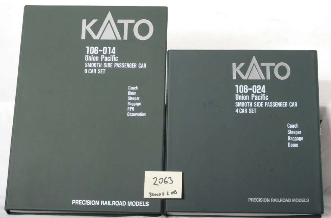Kato Union Pacifc E8 A-B-B 10 pass cars: Kato modern N scale Union Pacific E8 diesel A-B-B set and nine passenger cars in OBs. Passenger car sets are 106-014 and 106-024. Cars and locos are C8 condition, a few small detail parts missing from