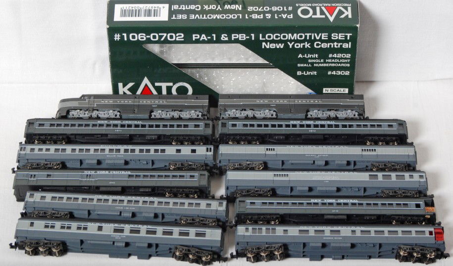 Kato NYC Alco PA A-B and nine passenger cars: Kato and RIvarossi modern N scale. Include Kato 106-0702 New York Central Alco PA A-B and a mix of nine Rivarossi and unmarked NYC passenger cars. Locos have OBs. Cars have hook style couplers C8.