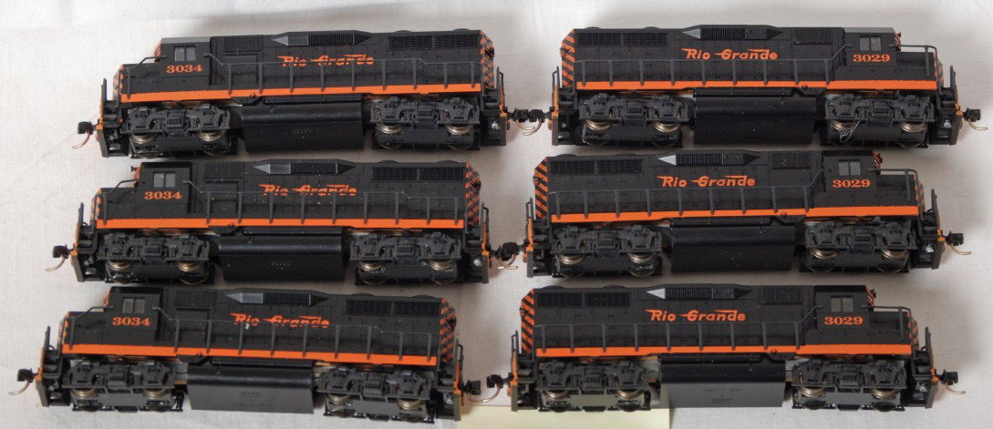 6 Kato Rio Grande GP38 locos: Kato modern N scale Rio Grande GP38 diesel locomotives. No boxes. Two horns broken otherwise C8.