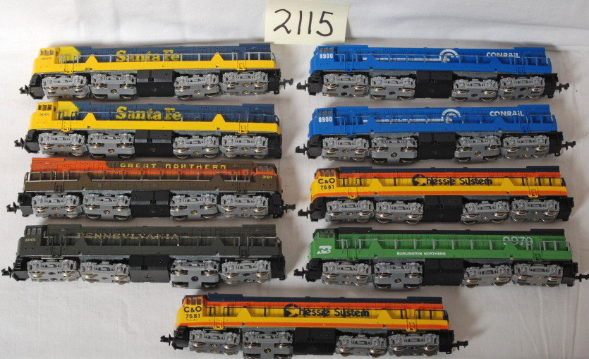 9 GE U50 diesel locomotives Conrail, Chessie, etc: Seven modern N scale GE U50 diesel locomotives. Includes two Conrail, two Chessie System, two Great Northern , one Pennsylvania, two Santa Fe, and one Burlington Northern. Locos have hook style couple
