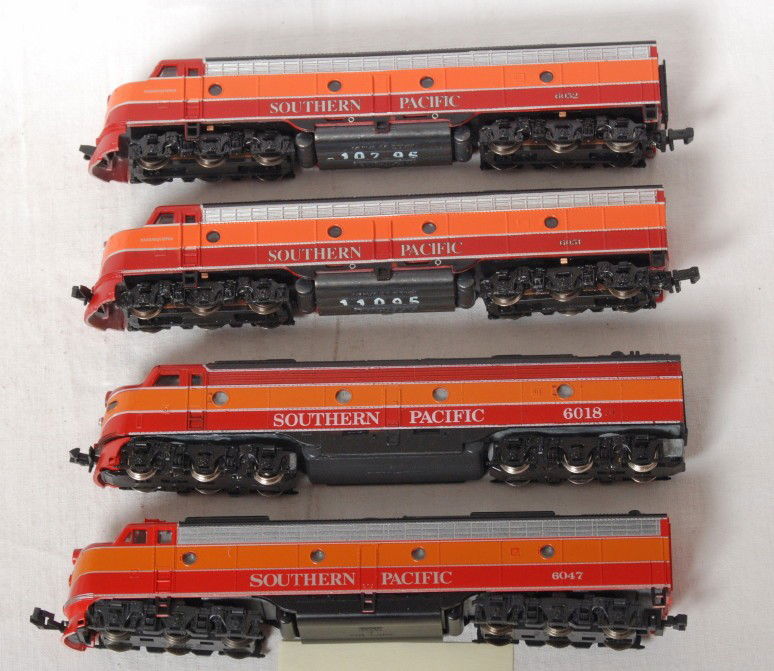 4 Southern Pacific Kato , Con Cor E8 A locos: Four Con Cor, Life Like and Kato modern N scale Southern Pacific E8 A units. Included are two Life Like, one Con Cor, and one Kato. Locos are C8 condition.