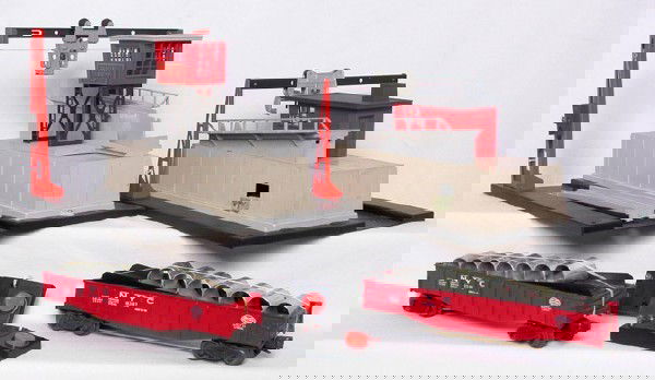 Lionel 342 and 345 culvert outfits in OB: Lionel 342 operating culvert loader and 345 operating culvert unloader, good railing on both, two 6342 NYC culvert cars with culverts, two 90 controllers, ramp, both could use some minor cleaning othe