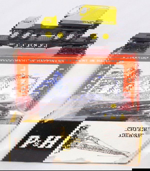 Lionel 6828 P&H crane car in the OB: Lionel 6828 P&H crane car with light yellow crane that is missing the long metal support rods otherwise is complete and original, C7-8. Outer OB has some tape, 6828-100 has some water damage, includes