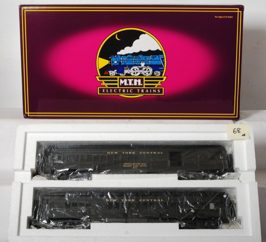 MTH New York Central 2 car Madison add on: MTH modern O gauge New York Central Madison combine and diner add on set. Catalog number is 20-4122. Cars are C9 area with little if any run time. Compliments lot 57. See photos for best description.