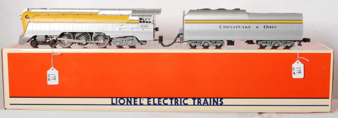 Lionel 18043 Chesapeake and Ohio yellowbelly Hudso: Lionel modern O gauge Chesapeake and Ohio 18043 yellow belly Hudson steam locomotive in OB. Loco features TMCC, Railsounds, smoke and more. Loco is generally C7-8 with some light dirt and spotting on 