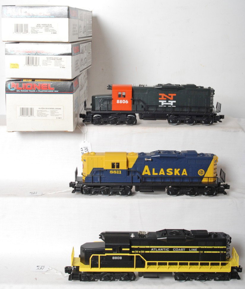 3 Lionel locomotives 18811, 18808, 18806: Lionel modern O gauge diesel locomotives in OBs. Three locos include 18811 Alaska SD-9, 18808 Atlantic Coast Line SD-18, and 18806 New Haven SD-18. Locos are generally C8-9. OBs have light wear and pr