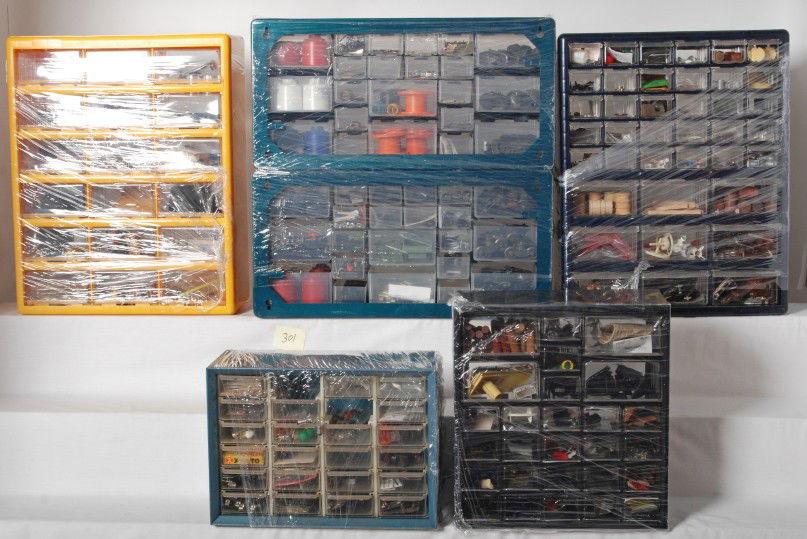 6 cases of Lionel replacement parts: Six cases of Lionel replacement and detail parts. Way too much to list, light bulbs, detail parts, coupler parts. Many common small items that must be replaced on Postwar Lionel trains. Nothing too un