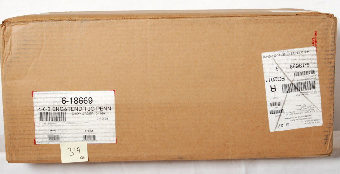 Lionel 18669 Illinois Central steam locomotive: Lionel modern O gauge JCPenney 18669 Illinois Central 4-6-2 Pacific cab no. 2099 with display case factory sealed in OB, C10.