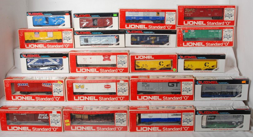 20 Lionel freight cars 9802, 9801, 9809, 19809, 16: Lionel modern O gauge freight cars in OBs. Twenty cars include 16314 Wabash flat with trailers, 19244 Louisville and Nashville boxcar, 9802 Miller reefer, two 9016 Chessie hoppers, 19509 Graham Bell r