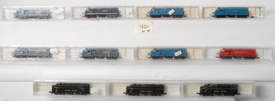 11 Bev-bel N scale locomotives: Bev-bel modern N scale diesel locomotives in OBs. Eleven locomotives include 17002 Mopac GP38, 17004 Lehigh Valley GP38, three 17003 Seaboard GP38, three 17005 Boston and Maine GP38s, and three Wester