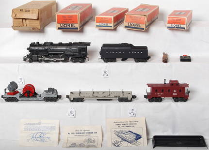 Lionel 2056, 2046W, 3361, 3650, 6357 in OB: Postwar Lionel O gauge 2056 steam locomotive, 2046W whistle tender, 3361 operating lumber car, 3650 searchlight extension car, and 6357 illuminated caboose. Trains look nicer clean C6, loco has