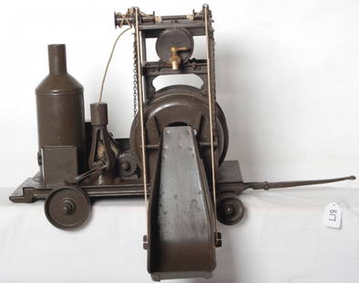 Buddy L pressed steel steam concrete mixer: Buddy L pressed steel steam concrete mixer, C6-7. Mixer measures approximately 23-1/4 inches long including tongue, 14 inches tall. Mixer retains 80% or more original paint.