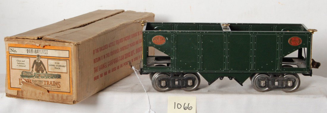 Lionel No. 215 ballast car in original box: Prewar Lionel standard gauge No. 215 ballast car in green paint in original box, C6+ shiny and clean in C8 original box.