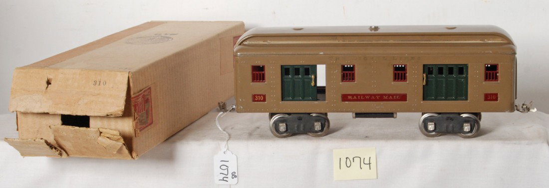 Lionel 310 RPO baggage/Railway Mail in OB: Prewar Lionel standard gauge No. 310 Mojave Railway Mail car nicer clean and shiny C6+. Box is square and solid with no missing flaps.