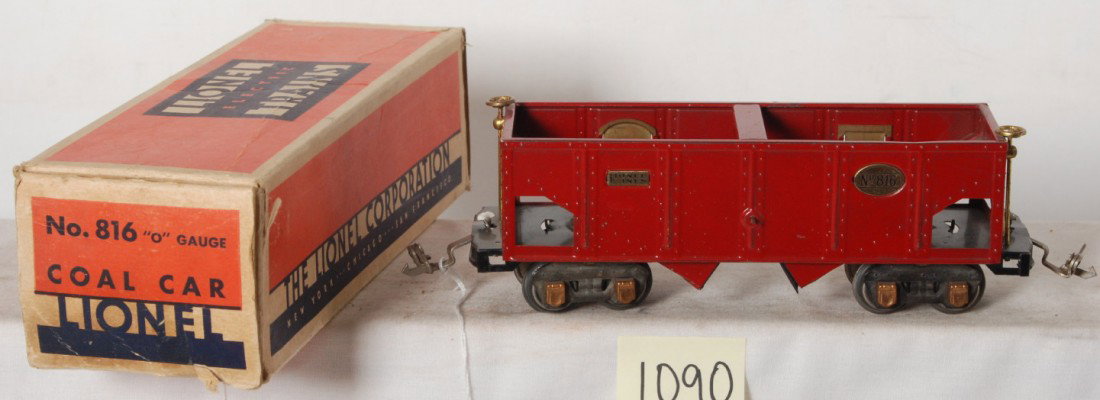 Lionel No. 816 red hopper in OB: Prewar Lionel O gauge No. 816 red hopper in original box, nice clean and shiny C6+. Box has been tape repaired, missing inner coupler protection flaps.