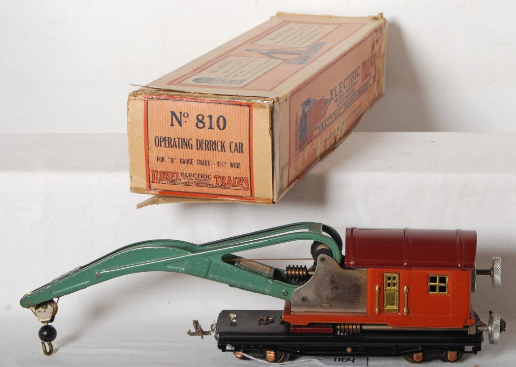 Lionel No. 810 operating derrick car in OB: Prewar Lionel O gauge No. 810 operating derrick car in original box, very nice C7+. Box has tape repairs, reproduction flaps.