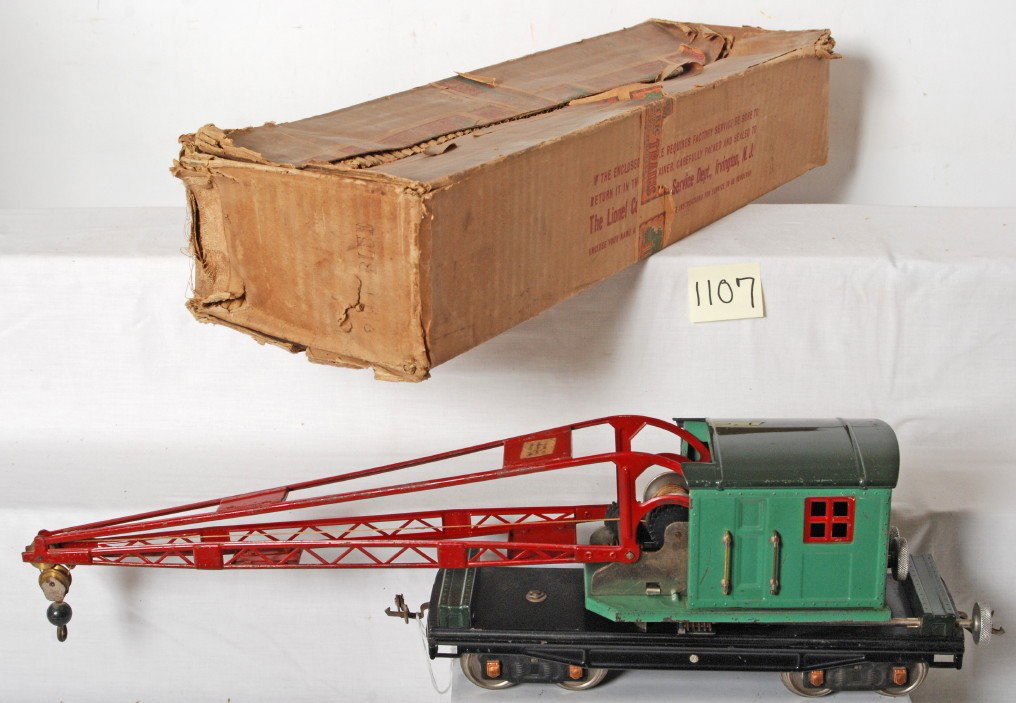 Lionel No. 219 P. Blue derrick in OB: Prewar Lionel standard gauge No. 219 operating derrick car in original box, very nice clean and shiny C6. Box has split cloth taped corner, O/W square and solid with no missing flaps.