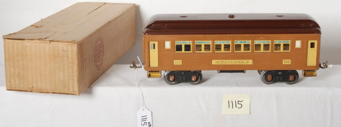 Lionel No. 309 Ivory/Brown Pullman in 310 OB: Prewar Lionel standard gauge No. 309 Pullman in Ivory/Brown, C7. Very clean and shiny car. Box is marked for 310, tiny tear to a top flap, O/W box looks C8 in shape.