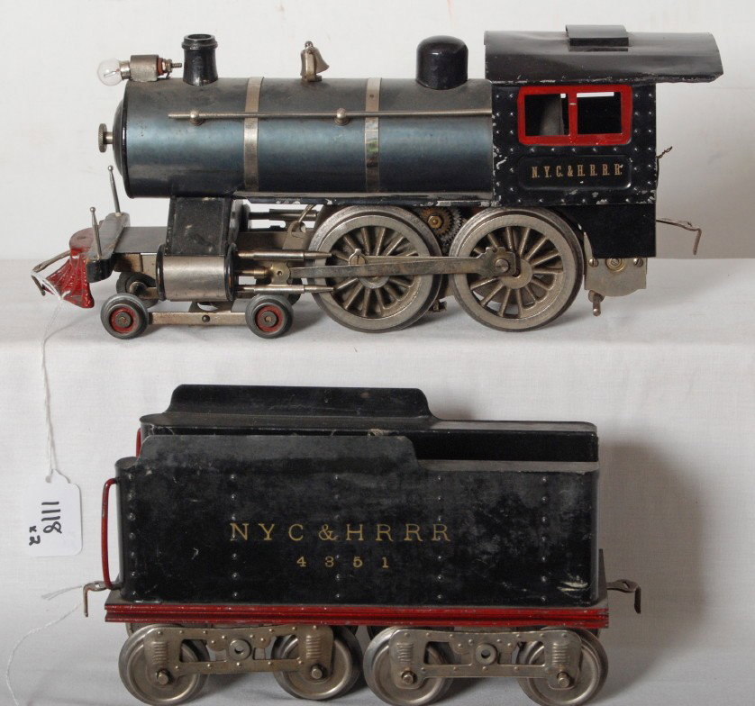 Lionel thick rimmed No. 6 steam loco w/tender: Prewar Lionel standard gauge No. 6 steam locomotive with tender, thick rims. Splitting of wood at pilot, otherwise nice clean C6.
