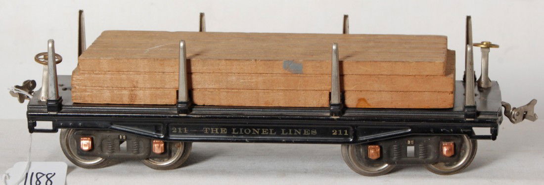 Lionel No. 211 flatcar w/lumber in black w/copper: Prewar Lionel standard gauge No. 211 flatcar in black paint with copper journals and original lumber load, C7 should clean and polish to look better.