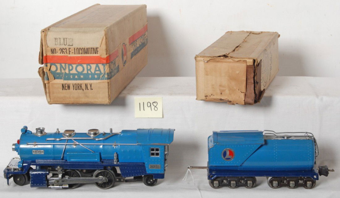 Lionel No. 263E Blue Comet loco and tender in OB: Prewar Lionel O gauge No. 263E in two tone blue for the O gauge Blue Comet passenger train. Loco and tender are super clean and shiny C6++. Boxes are C8 in shape, tender box has split taped corner and
