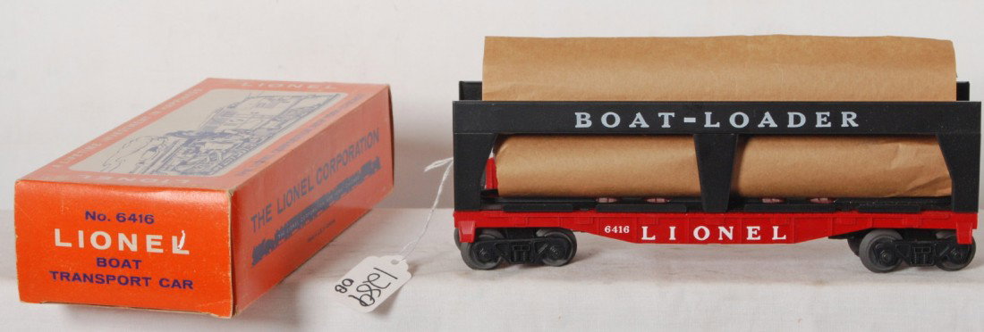 Mint Lionel 6416 boat loader, OB: Lionel postwar O gauge 6416 boat loader car, unrun with mint boats in wraps, C9-10. OB C8.