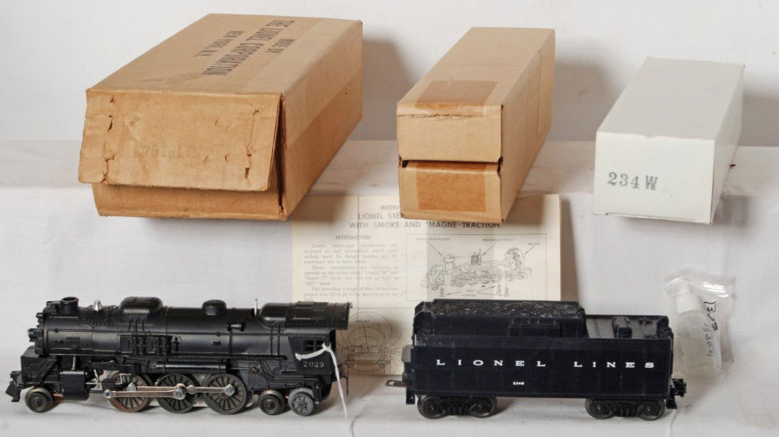 Lionel 2029 steam loco in neat master carton: Lionel postwar O gauge 2029 steam loco and 234W tender, high grade C8+. Very neat master carton with 2029LTS stamped on ends, 234W white box is missing one end flap and engine box includes inst. sheet