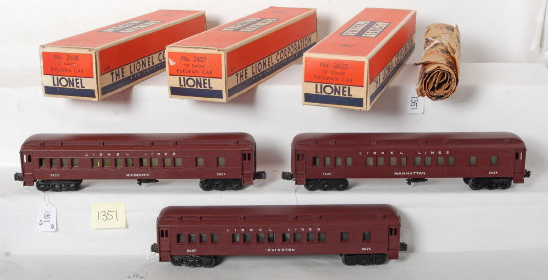 Lionel 2625 Irvington, 2627 Madison, 2628 Manhatt: Postwar Lionel O gauge No. 2625 Irvington Pullman, No. 2627 Madison Pullman, and No. 2628 Manhattan Pullman, passenger coaches in original boxes with inserts and wrapping paper. Trains looks C8 area.