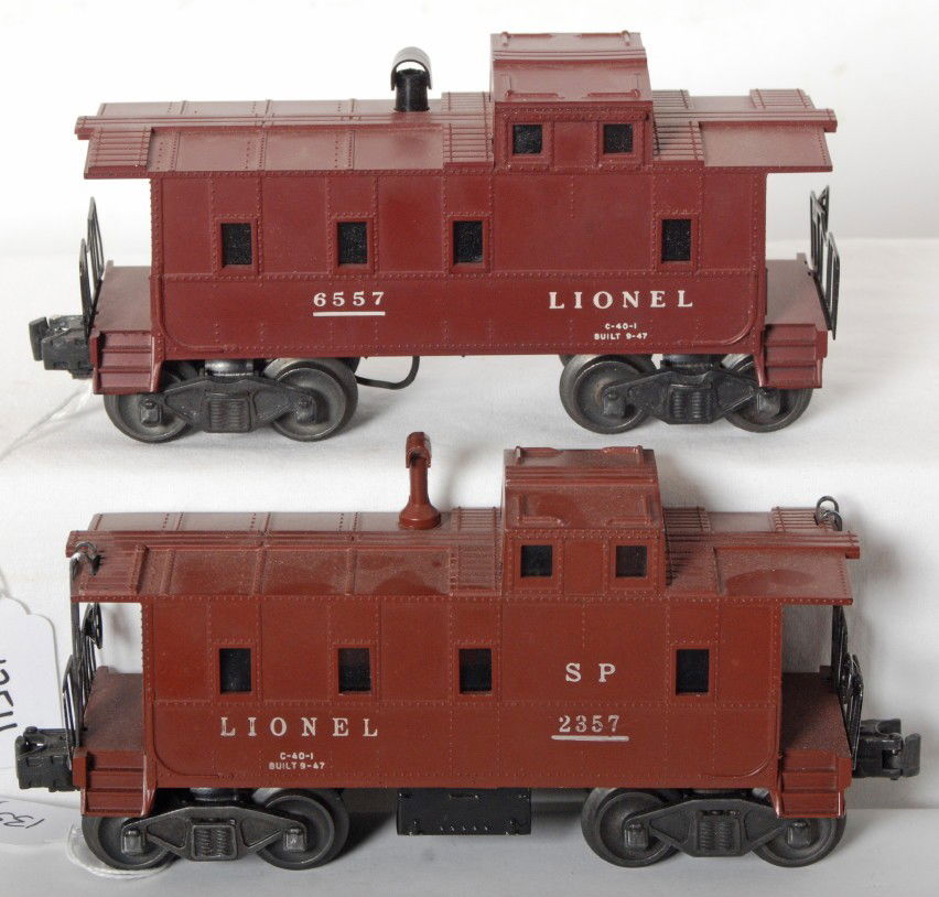 Lionel No. 2357 SP and No. 6557 smoking caboose: Postwar Lionel O gauge No. 2357 SP caboose and No. 6557 smoking caboose. Cabooses should clean and polish to look very nice C8 area.