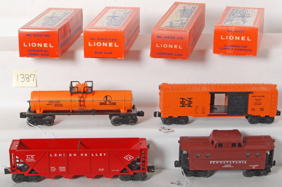 Lionel 6315-50, 6464-735, 6436-110, 6437 in OB: Postwar Lionel O gauge 6315-50 GRCX chemical tank car, 6464-735 New Haven boxcar, 6436-110 Lehigh Valley hopper, 6437 Pennsylvania N5c porthole caboose, unrun C8-10. Boxes are C9 area.