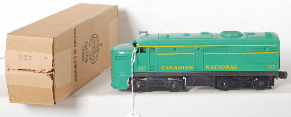 Lionel No. 227 Canadian National diesel Alco A in: Postwar Lionel O gauge No. 227 Canadian National diesel Alco A unit in original box, unrun C7. Box looks C9-10, crisp with nice ink stamped numbers.