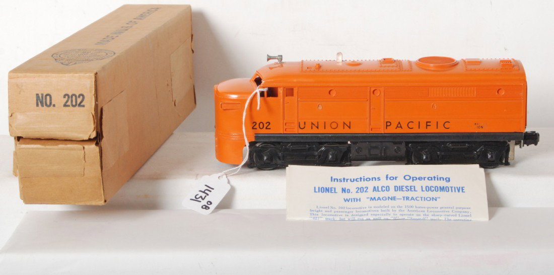 Lionel No. 202X Union Pacific diesel Alco A unit : Postwar Lionel O gauge No. 202X Union Pacific diesel Alco A unit in original box with original sheet of wrapping paper. Train looks C7. Box looks C8+. Original instructions sheet included.