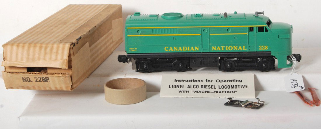 Lionel No. 228P Canadian National Alco A unit in : Postwar Lionel O gauge No. 228P Canadian National diesel Alco A unit in original box with coupler protection ring, lubricant and oil tubes, CTC Lockon and original instructions sheet included. Loco lo
