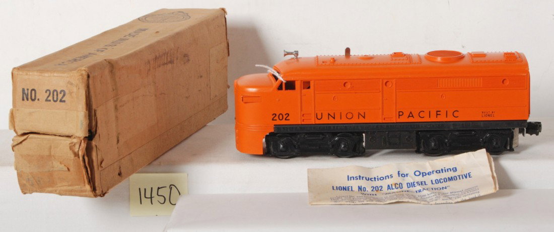 Lionel No. 202X Union Pacific Alco diesel A unit : Postwar Lionel O gauge No. 202X Union Pacific diesel Alco A unit in original box with original instructions sheet, nice clean and shiny C7. Box looks C7.