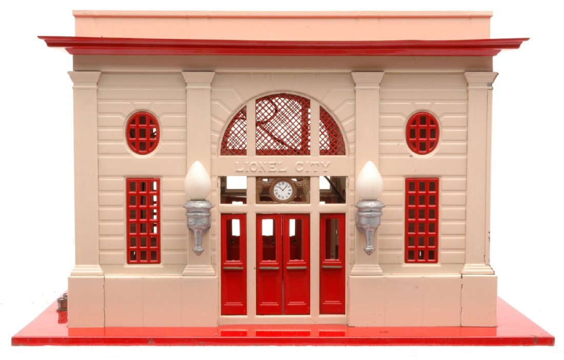 Lionel Prewar Standard Gauge 115 Station: Lionel prewar standard gauge 115 station with vermilion base, roof, skylight, window inserts and doors, ivory walls and aluminum painted light fixtures. Station is C7-8.