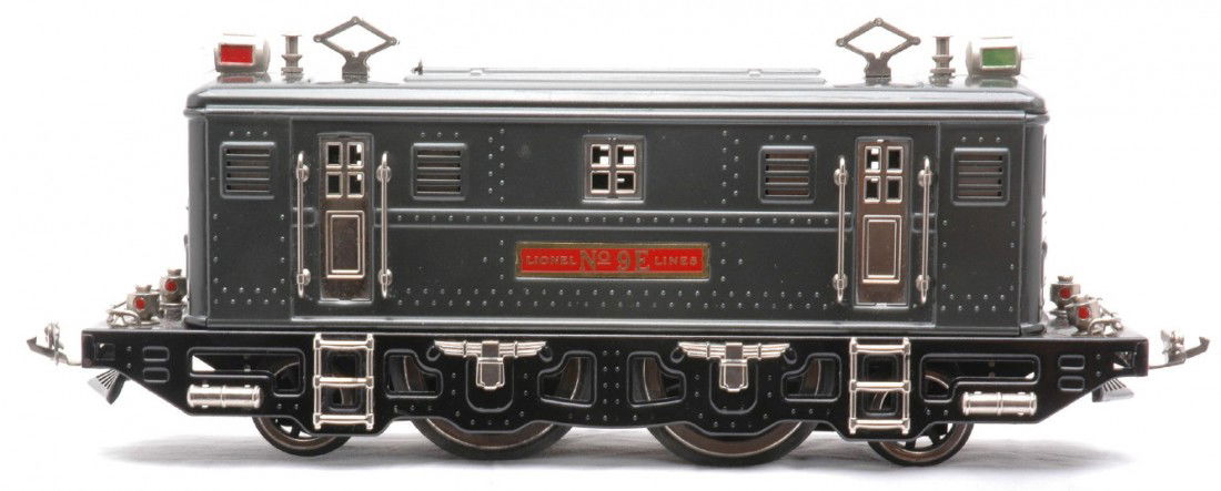 Lionel 9E Gunmetal 2-4-2 Electric Loco MINT: Lionel prewar standard gauge 9E gunmetal 2-4-2 electric loco with nickel trim. The engine has light run, C8-9.
